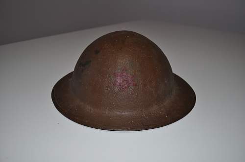 2 Flashed US Brodie M1917 Helmets