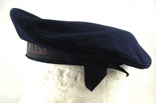 Is this a ww1 british Royal Navy cap?